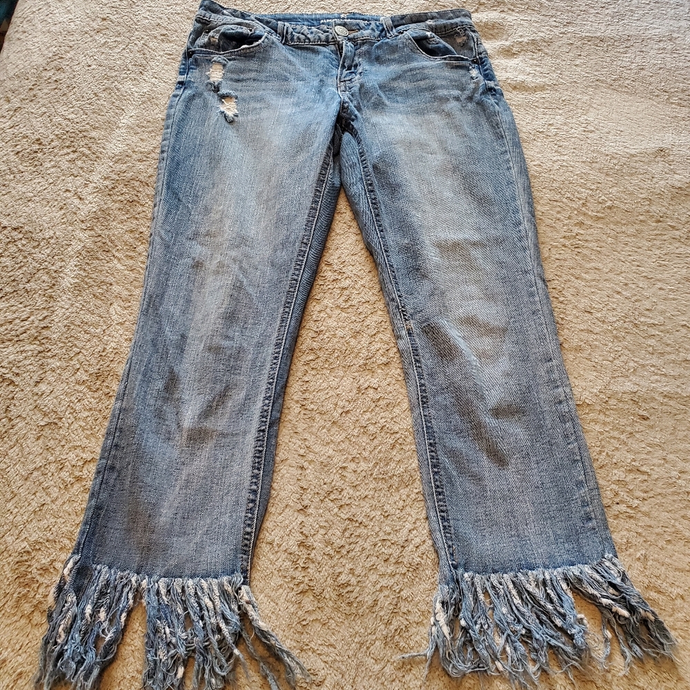 Low rise jeans with fringe